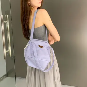 Корейская версия минималистичной вместительной сумки под руку с вышивкой в виде сердца Canvas Art Универсальная женская сумка через плечо для покупок Изображение